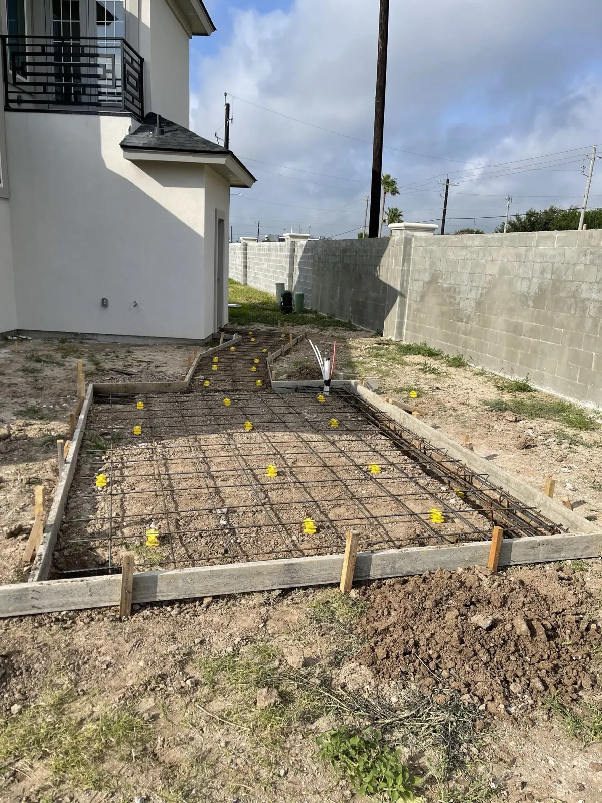 Outdoor kitchen foundation — rebar and concrete forms being set