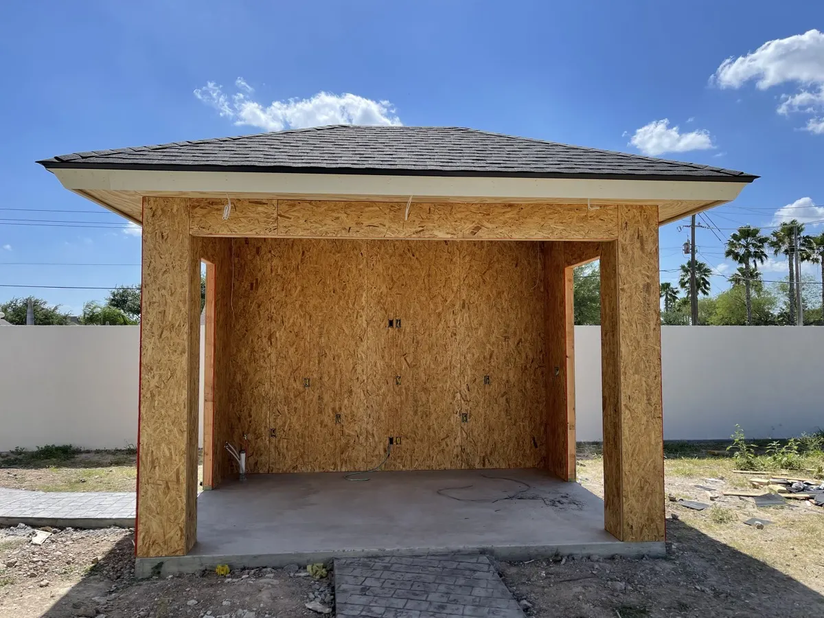 Outdoor kitchen framing — OSB sheathing with shingled roof