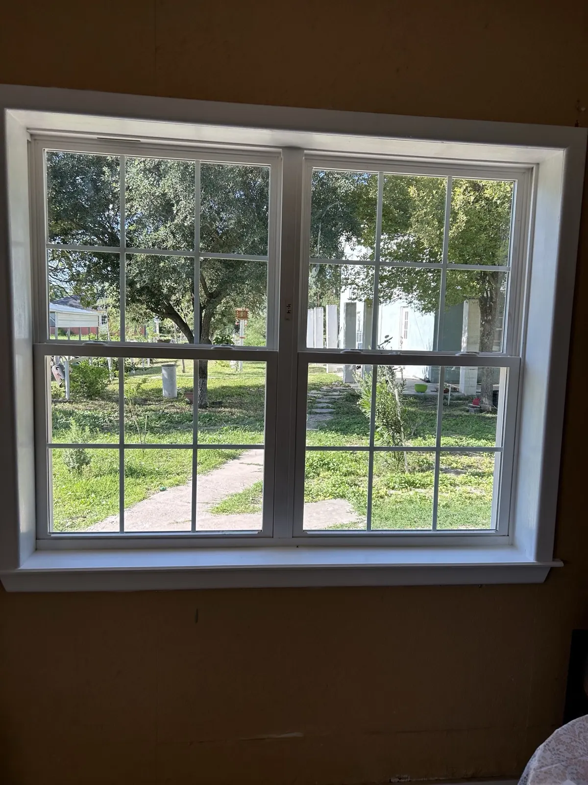 New window — interior view looking out through grid-style window
